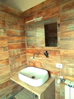 a bathroom with a sink and a mirror at Tempio del Sole in Rome