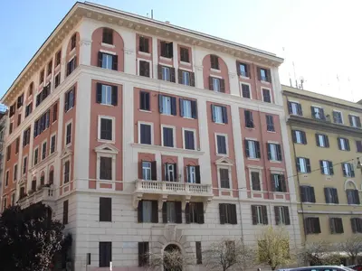 a large brick building with a balcony at B&B La Bella Giuliana in Rome