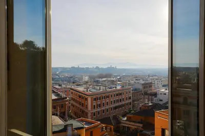a view of a city from a window at La Dolce Vista Trastevere in Rome
