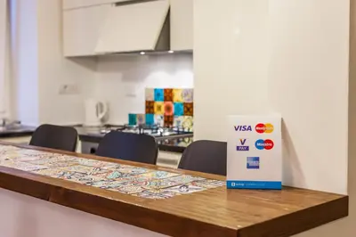 a table with a visa sign sitting on top of it at Wake At Rome in Rome