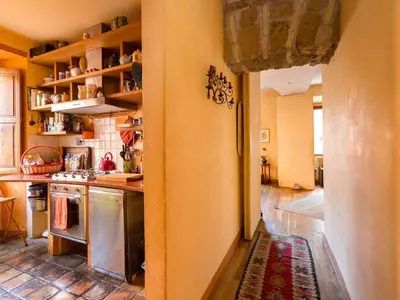 a kitchen with a sink and a stove at Apartment 'Colo' by Interhome in Rome