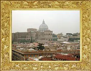 a framed picture of a city with a building at Terrazza San Pietro in Rome