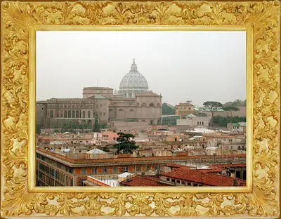 a picture of a city in a gold frame at Terrazza San Pietro in Rome