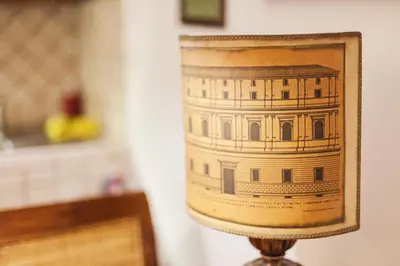 a cup with a picture of a building on it at TrastEver Holiday in Rome
