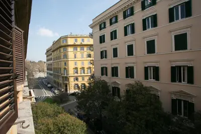 a view of a street between two buildings at Cola Di Rienzo A E B in Rome