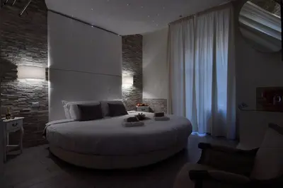 a bedroom with a large bed in a room at Vatican Tourist Inn in Rome