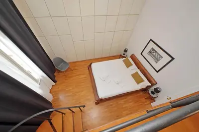 an overhead view of a staircase in a house at Amleto Apartments in Rome