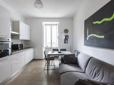 a living room with a couch and a table at Apartment Il Piccolo by Interhome in Rome