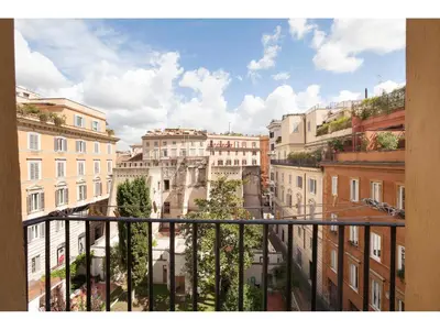 a view of a city from a balcony at Apartment Via Giulia in Rome