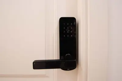 a black door handle on a white door at Relais Pamphili guest house by Ghor in Rome