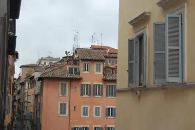 a group of buildings on a city street at Navona Family Apartment in Rome