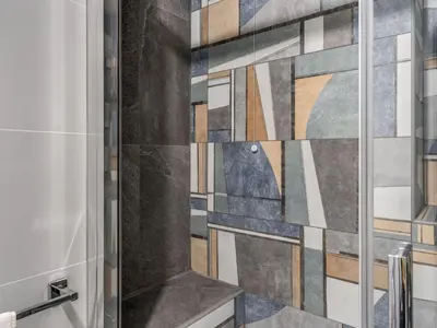 a bathroom with a shower with a tile wall at Apartment Wohnung mit Wi-Fi by Interhome in Rome