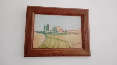a painting of a field and a house at Residenza Laterano in Rome