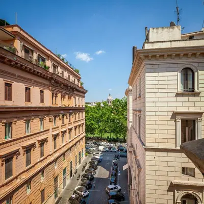 an aerial view of a city street between two buildings at Residenza Cavallini in Rome