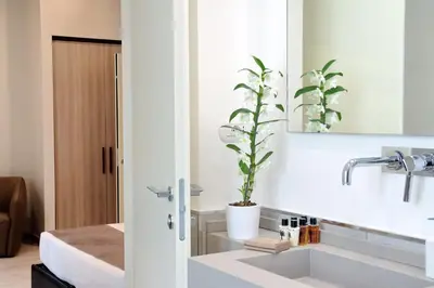 a bathroom with a sink and a mirror at Relais Servio Tullio in Rome
