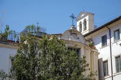 a building with a tree in front of it at The Right Place 4U Quercia Apartment in Rome