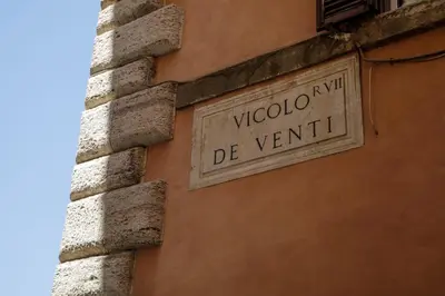 a sign on the side of a building at The Right Place 4U Quercia Apartment in Rome