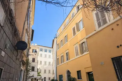 an alley in an old city with buildings at Studio Coppelle in Rome
