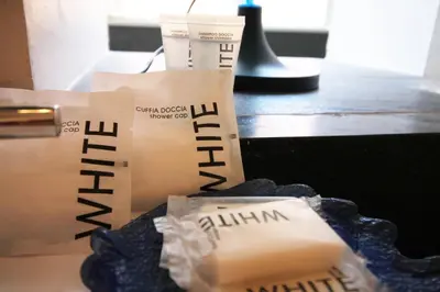 a couple of bags of cheese sitting on a table at The Trevi Fountain and Spanish Steps Experience in Rome