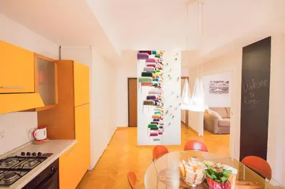 a kitchen with a glass table in a kitchen at Polacchi 42 Apartment in Rome