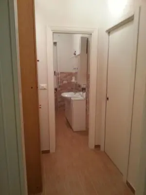 a bathroom with a sink and a mirror at Home Sweet Home in Rome