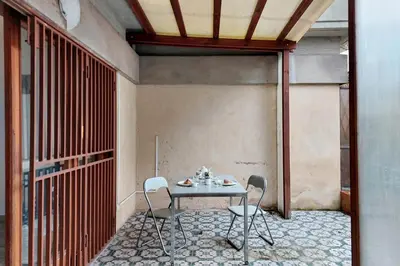 a table and two chairs in a room at 4BNB - Viale Vaticano terrace retreat in Rome