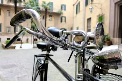 a bike parked on a street with its handle bars at Guest House Interno4 in Rome