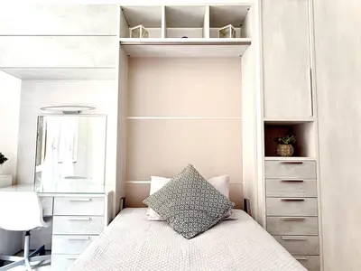 a bedroom with a bed and a desk at Apartment Roman Haven by Interhome in Rome