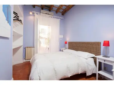 a room with a wooden ceiling in a room at Apartment Via Farina in Rome