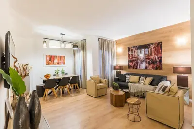 a living room with a couch and a table at Thebestinrome Vite in Rome