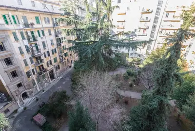 an aerial view of a city with tall buildings at Domus Eugenia in Rome