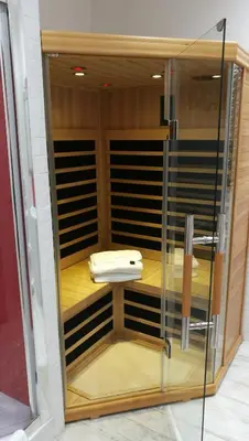 a glass cabinet with a sink in a room at Two Chic Guesthouse in Rome