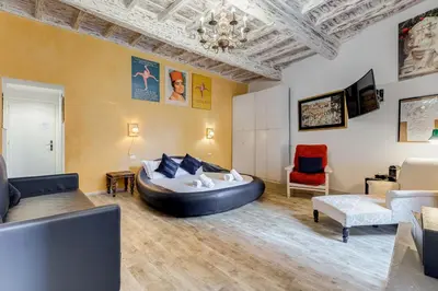 a large living room with a large inflatable couch at Trevi Art Suite in Rome