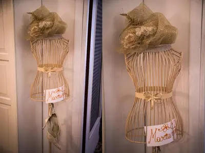a dress is hanging on a door with a sign at Il Leoncino in Rome
