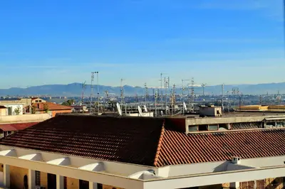 a view of a city with buildings and boats at Casetta Fleming in Rome