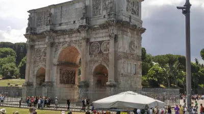 a large building with a tent in front of it at St. John Apartment in Rome