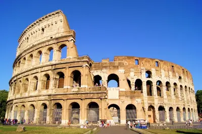 an amphitheatre of the colosseum with people standing around it at Domus al Palatino in Rome
