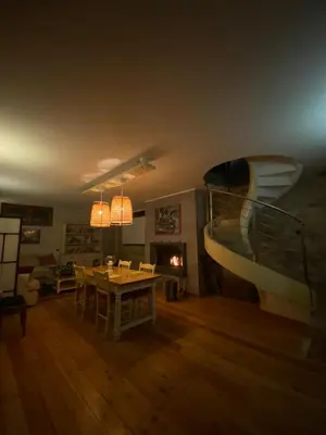 a living room with a table and a boat in it at Aurelia Garden Gold B&B in Rome