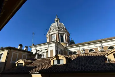 a building with a tower on top of a roof at B&B Casa Angelini in Rome