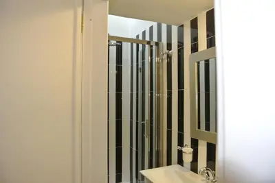 a bathroom with a sink and a mirror at Pantheon Domus Valentino in Rome