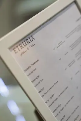 a close up of a menu on a cell phone at Etruria Relais in Rome