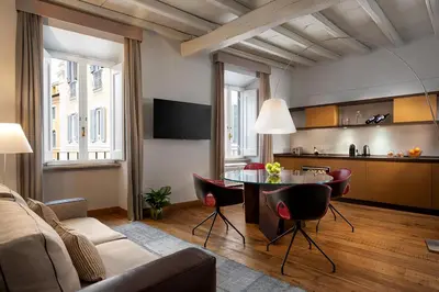 a living room with a couch and a table at Palazzo Scanderbeg in Rome