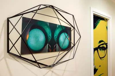 a picture of a traffic light hanging on a wall at Suitedreams in Rome