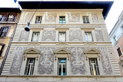 a building with ornate detailing on the side of it at Spagna Ave in Rome