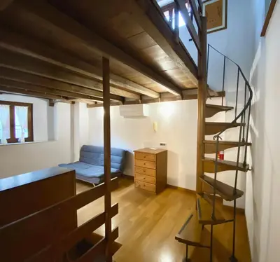 a room with a bunk bed and a staircase at Casa Paradiso in Rome