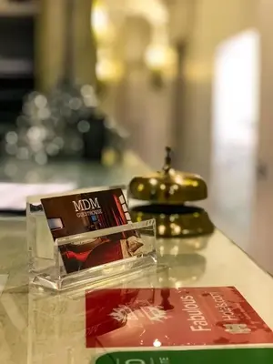 a book sitting on top of a table at MDM Guesthouse in Rome