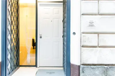 an open door of a house at Casa Brunetti in Rome