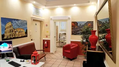 a office with a desk and a computer in a room at B&B Arco Di Gallieno in Rome