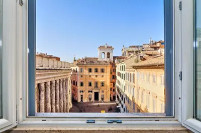 a view of a city from a window at Pantheon Family Romantic Suite in Rome
