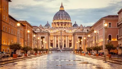 a view of the vatican city at dusk at Rome Apartment with terrace Autonomous in Rome
